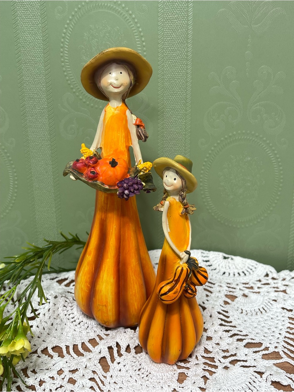 Whimsical mother daughter fall harvest pencil figurines.  Made of resin.